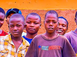 Mentor leading a boy child mentorship session with boys in Kakamega