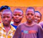Mentor leading a boy child mentorship session with boys in Kakamega